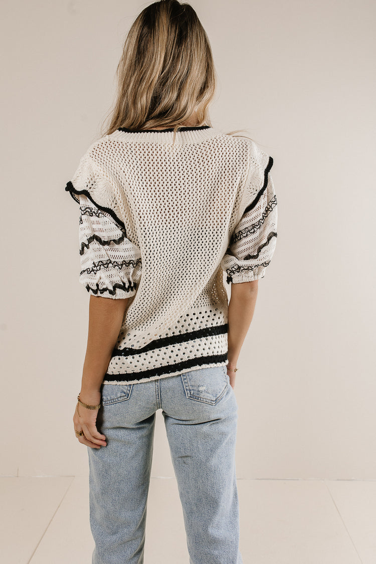 contrast sweater top in black and cream