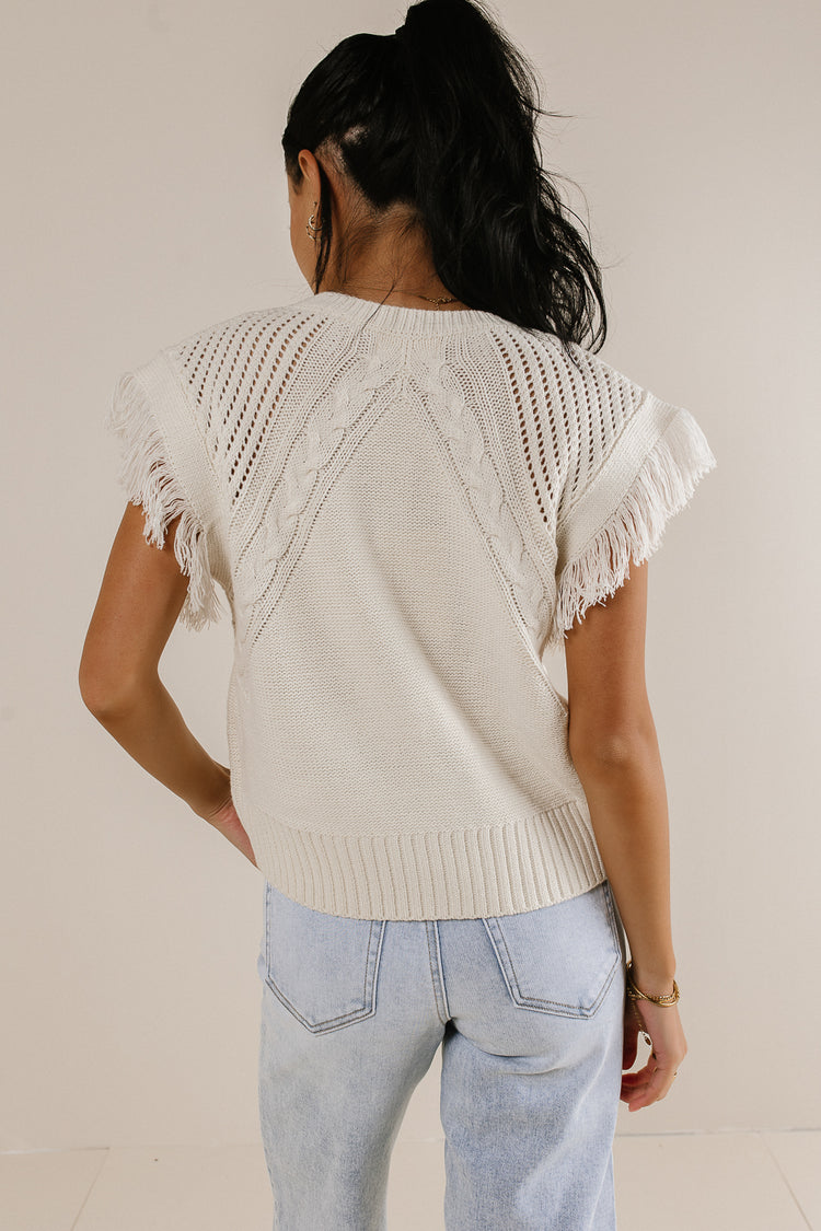 knit short sleeve top with fringe detail