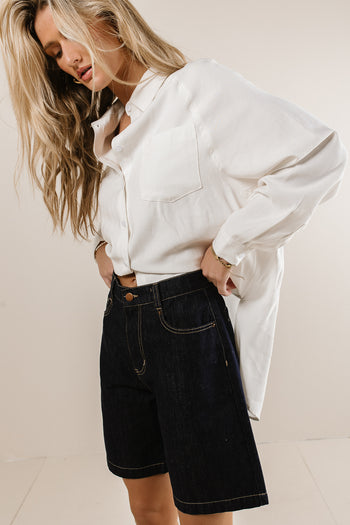 dark wash bermuda style shorts