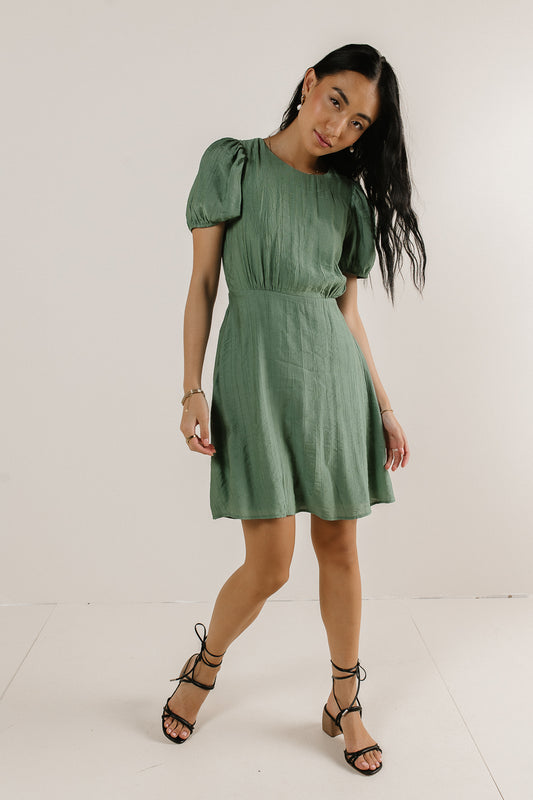 green mini dress with puff sleeve