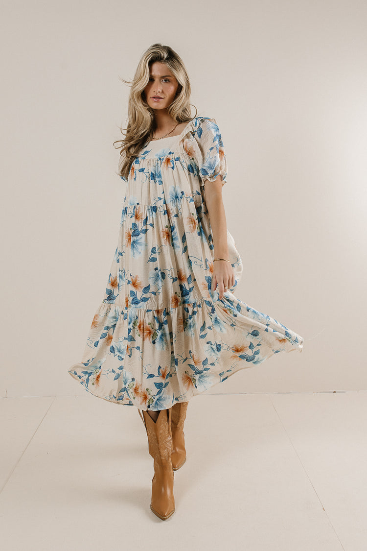 tiered midi dress with blue and rust flowers