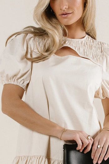 Front cut out dress in cream 