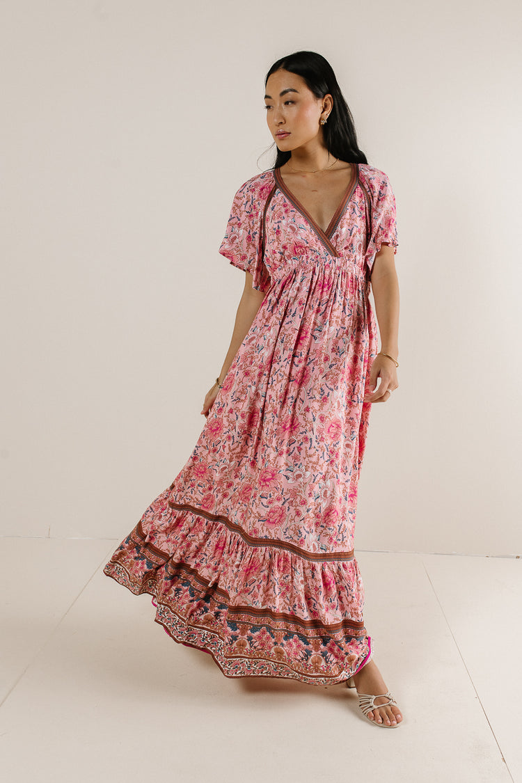pink maxi dress with flutter sleeve