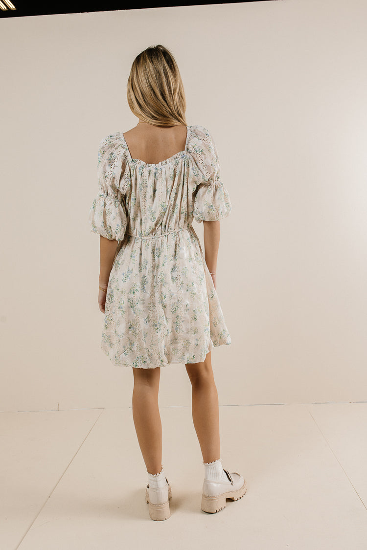 eyelet mini dress in cream with blue flowers
