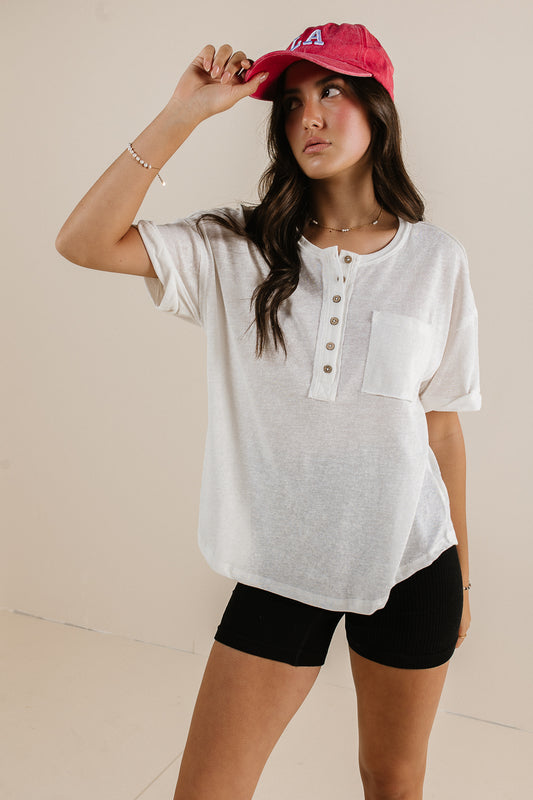 white loose fit henley top with pocket
