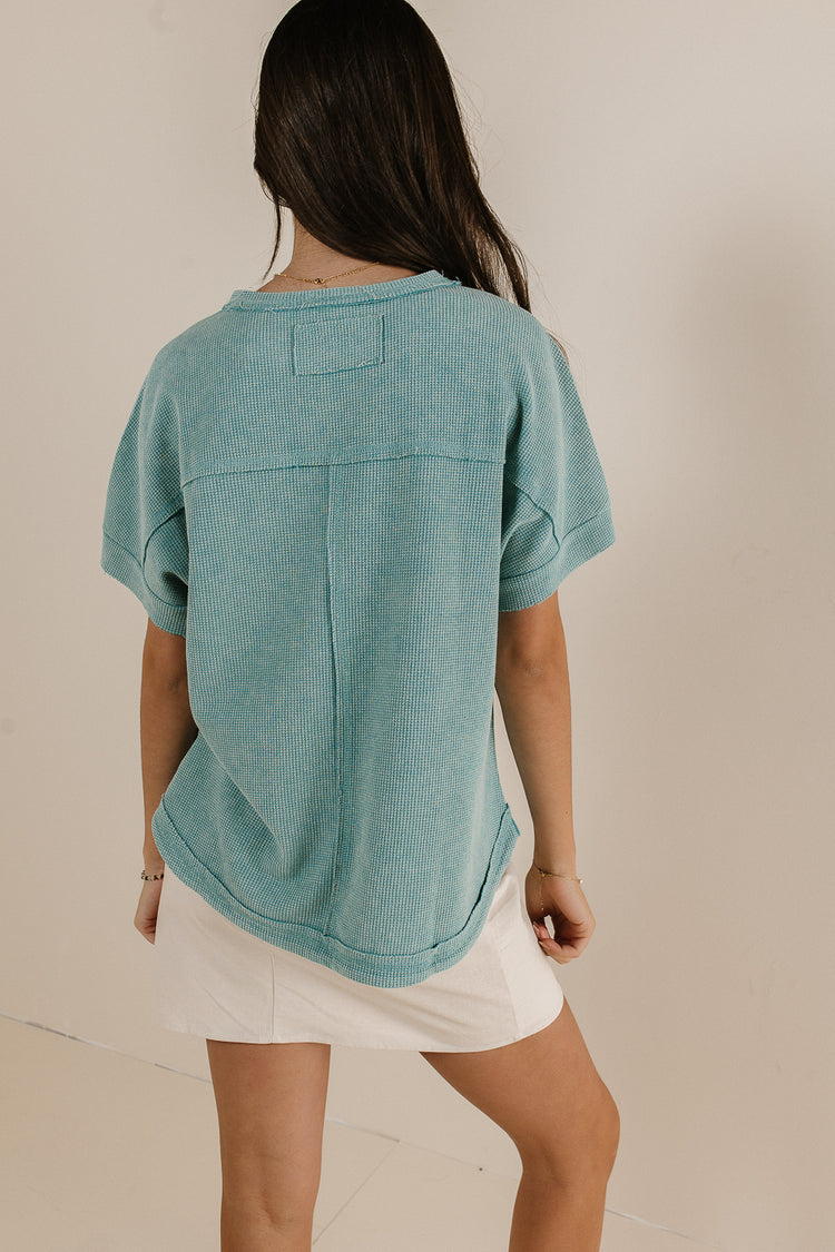 textured top with seams