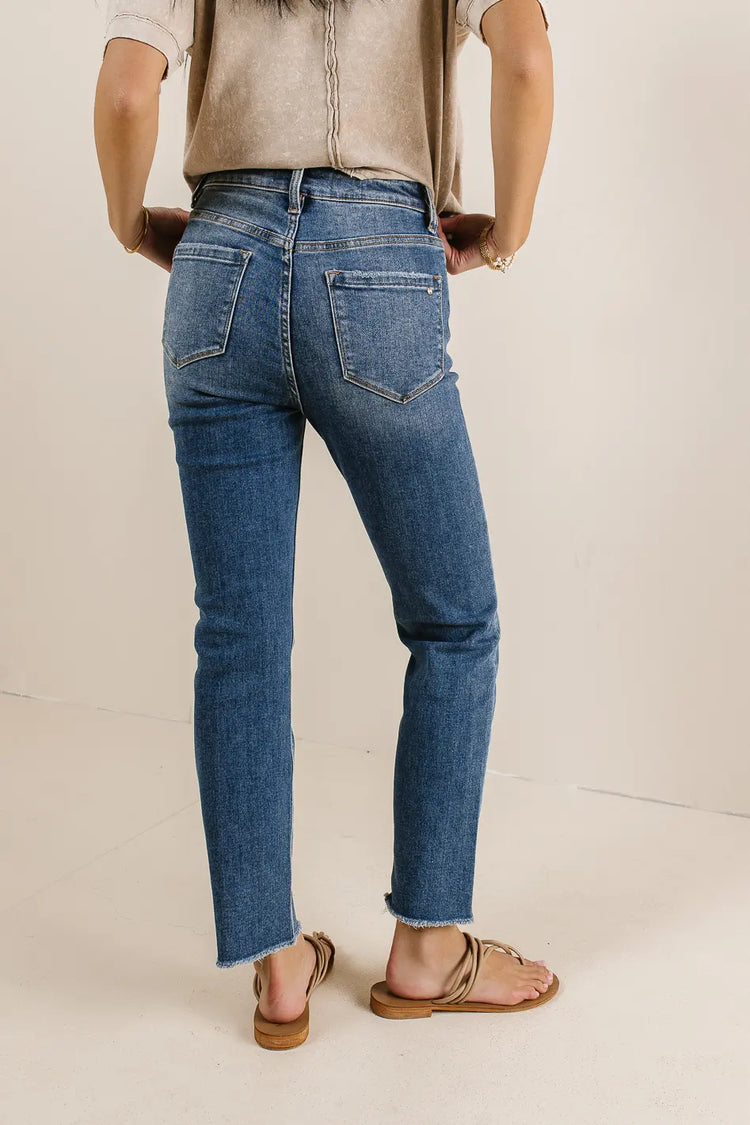 Two back pockets medium wash jeans 