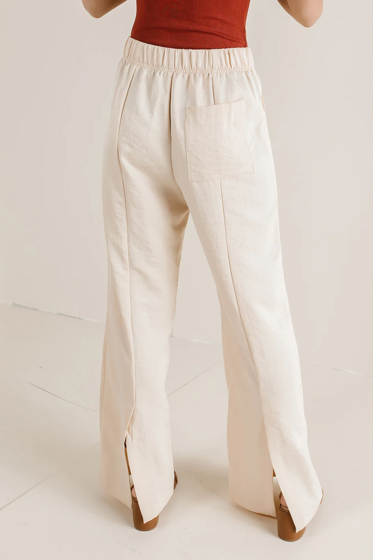 One side pocket pants in cream 