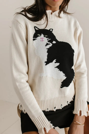 Ribbed hen and cuff sweater in cream 