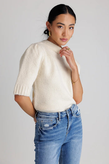 Mock neck sweater top in cream 