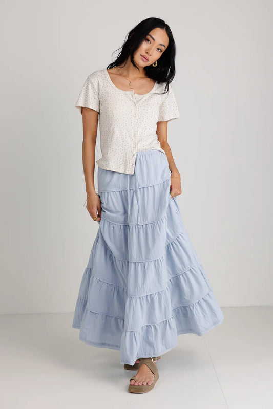 Top paired with a maxi skirt 