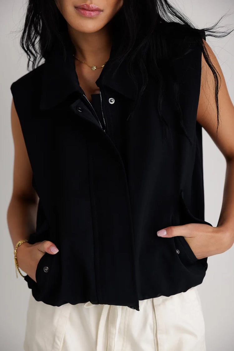 Buttons front detailed vest in black 
