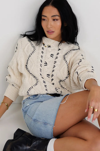 Cable knit sweater in cream 