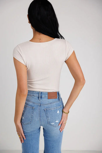 Ribbed bodysuit in bone 