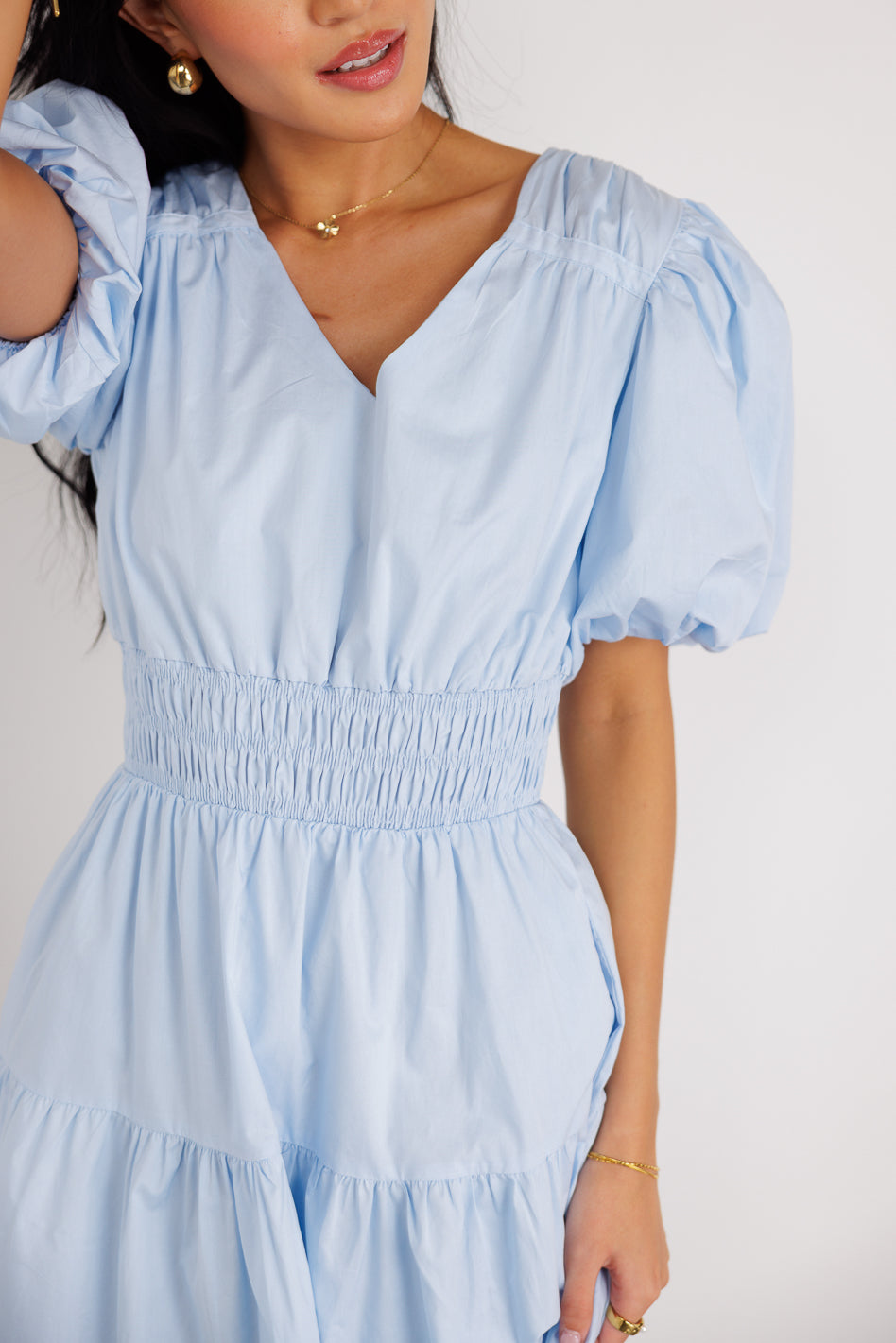 blue dress with cinched waist 