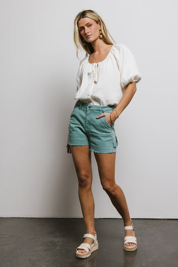 raw hem shorts in teal