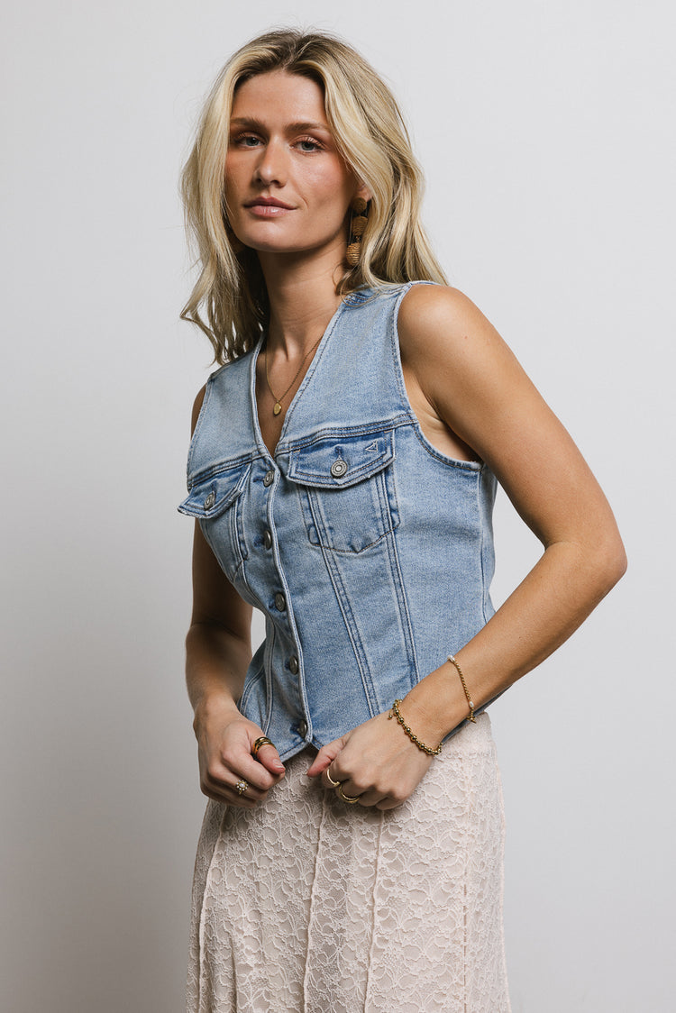 sleeveless light wash denim vest