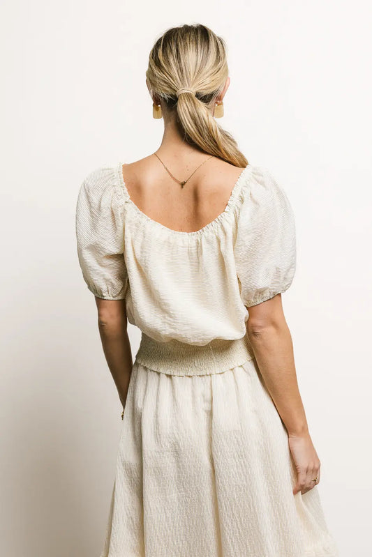 Elastic off shoulder blouse in cream 