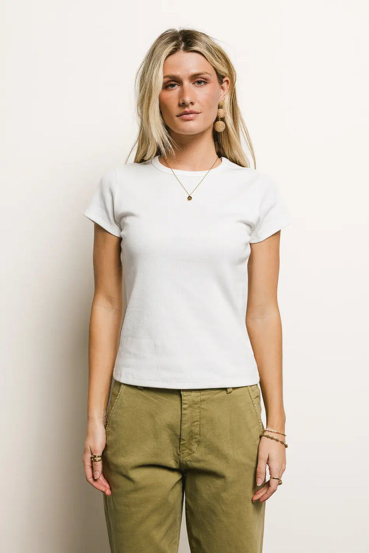 Basic top in white paired with jean in moss 