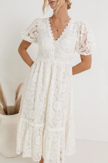 scalloped V-neckline