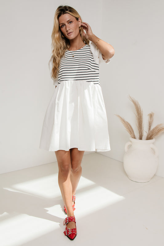 white dress with black striped bodice