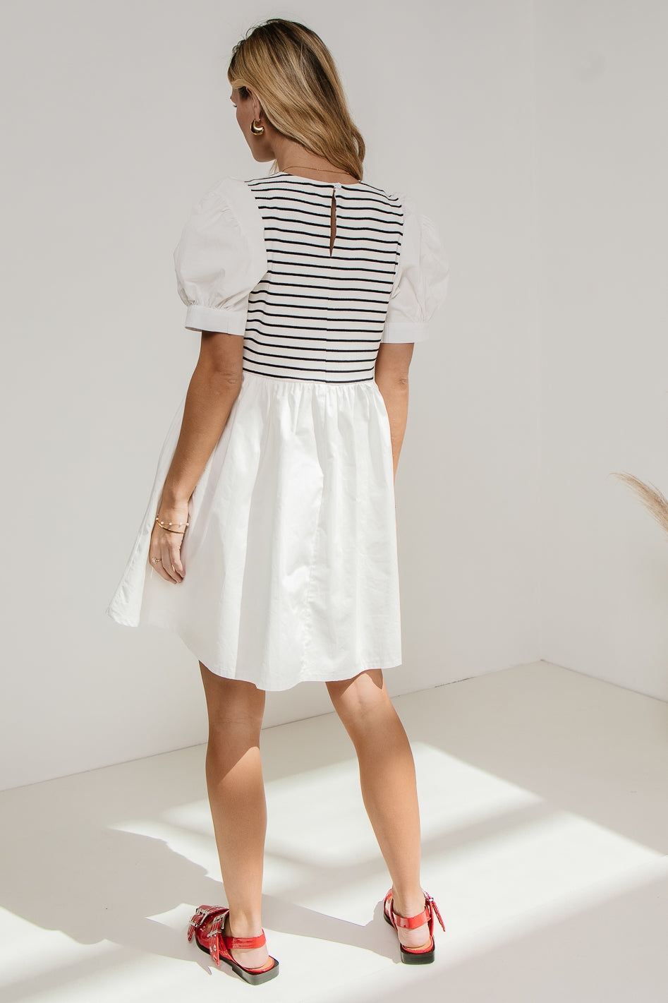 puff sleeve mini dress in white and black