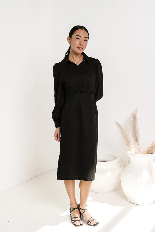 modest black long sleeved dress