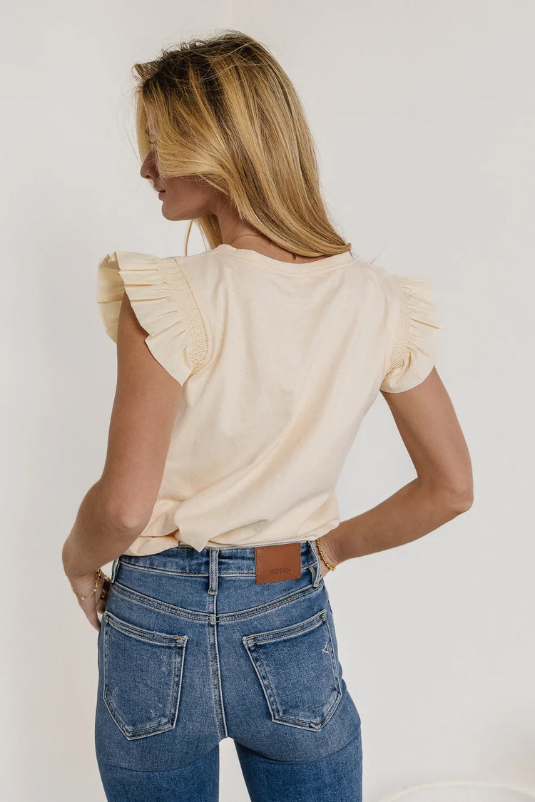 Ruffle detailed sleeves top in ivory