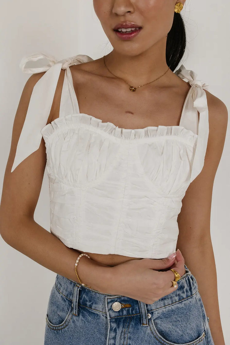 Adjustable shoulder straps crop top in white 