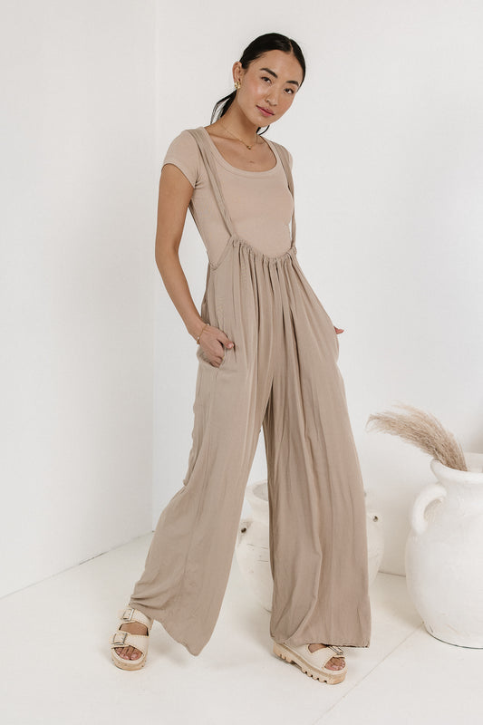 overall pants in sand
