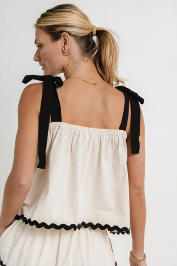 Two black straps top in cream 