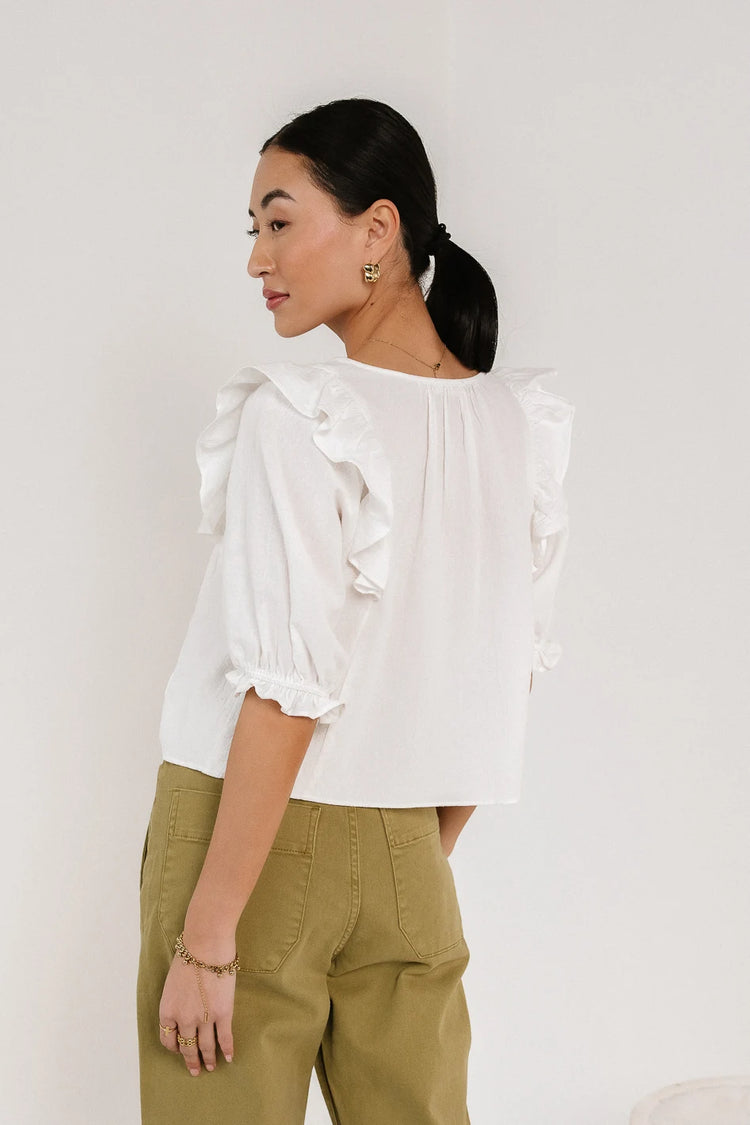 Ruffle shoulder detailed blouse in white 