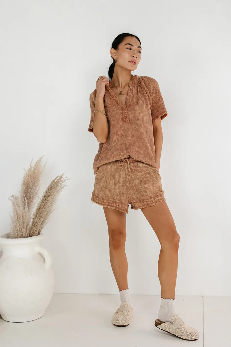 Top in mocha paired with a mocha shorts 