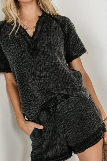 Short in black paired with a black top 