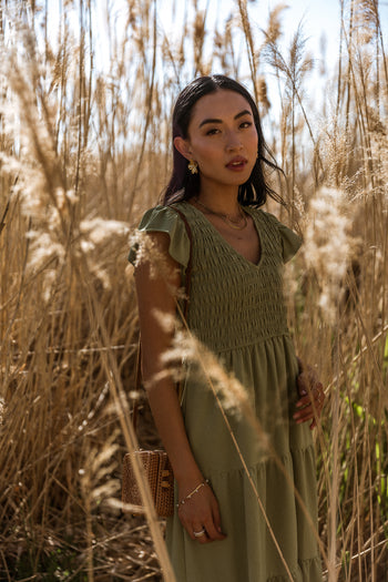 smocked detail dress with ruffle sleeves