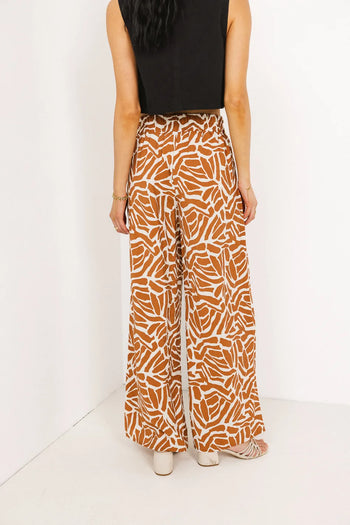 Printed pants in rust and cream 