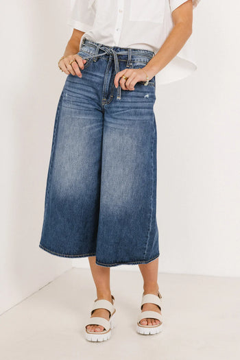 Adjustable waist tie pants in medium wash 