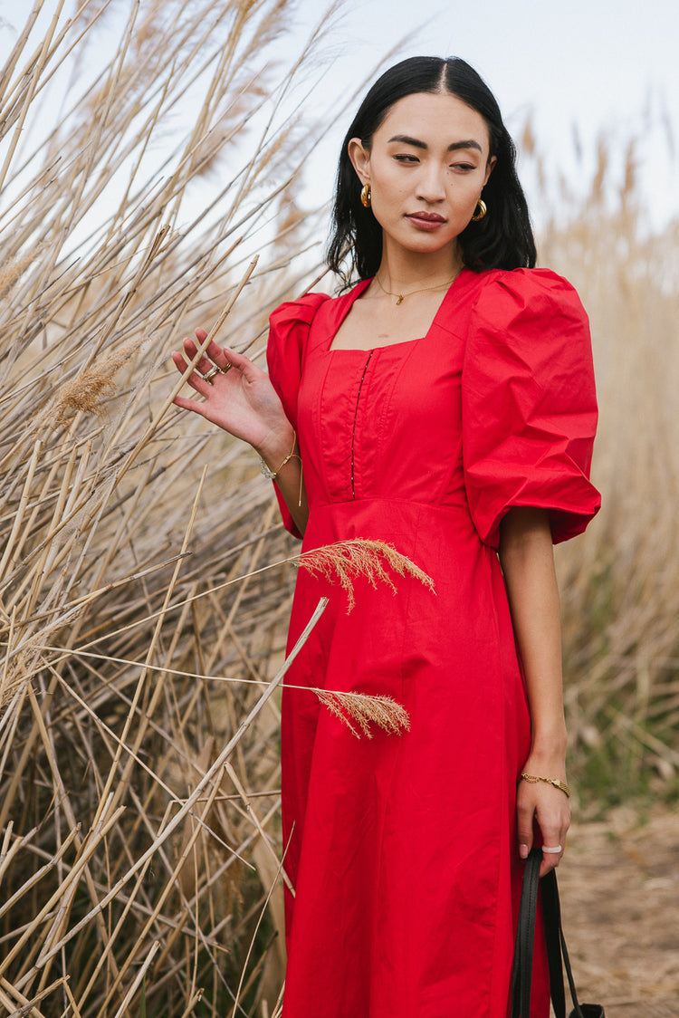 red puff sleeve dress