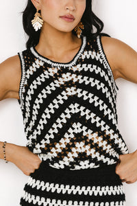 black and with crochet sweater vest