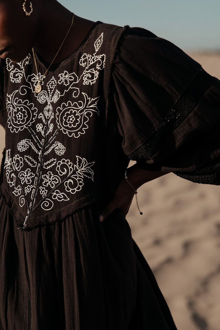 black embroidered dress