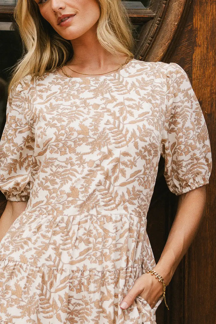 Round neck dress in cream 