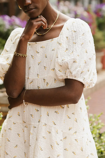 Square neck dress in cream 