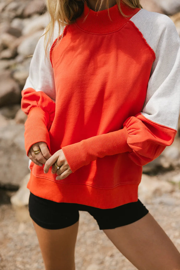 Long ribbed cuff sleeves sweatshirt in orange 