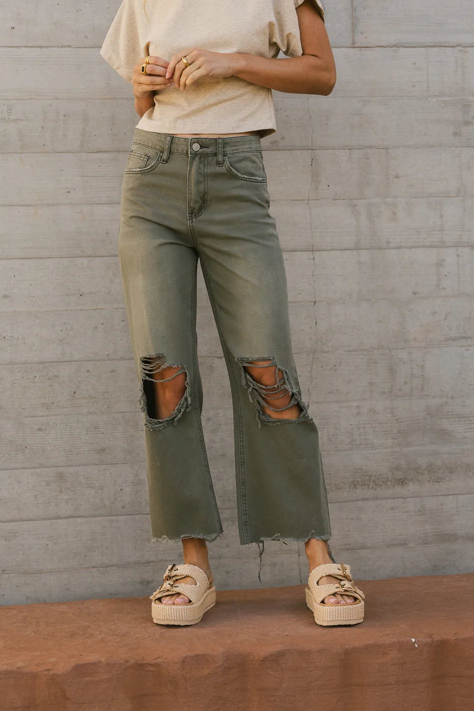 Army green distressed jeans store