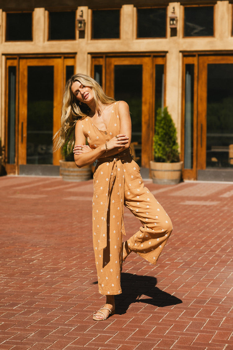 embroidered jumpsuit with front buttons in camel