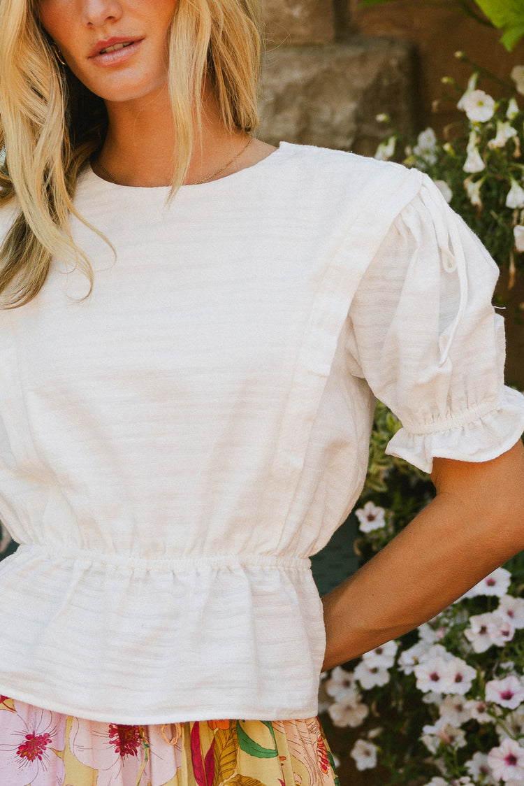 white peplum blouse