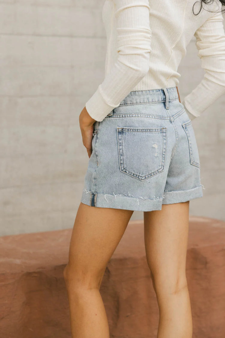 Distressed pocket denim shorts in light wash 