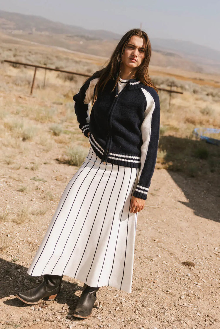 Skirt in cream paired with a sweater 