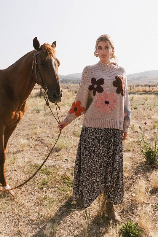 printed dress with floral embroidered sweater