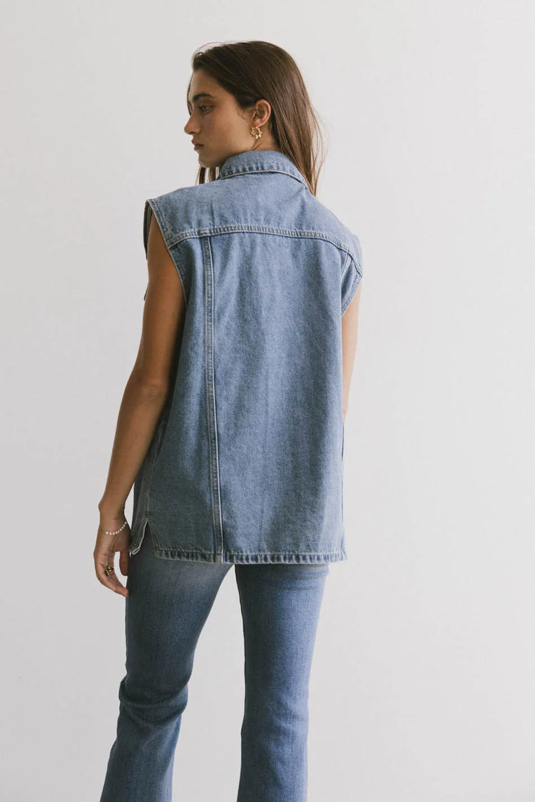 Plain color denim vest in medium wash 